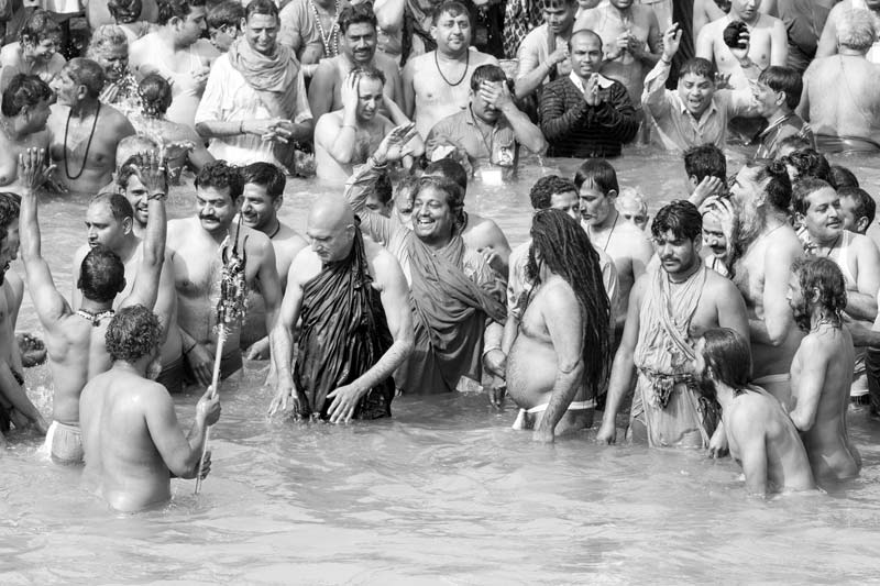 Acharya Mahamandaleshwar Swami Sri Avadheshanand Giriji of Juna Akhara performing Shahi Snan in river Ganga along with his disciples on the occasion of Kumbh at Har ki Pauri, Haridwar, Uttarakhand
